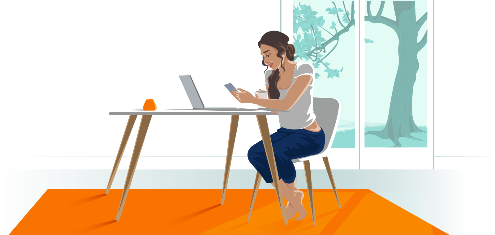 woman with phone and laptop A woman at a table with a phone and a laptop