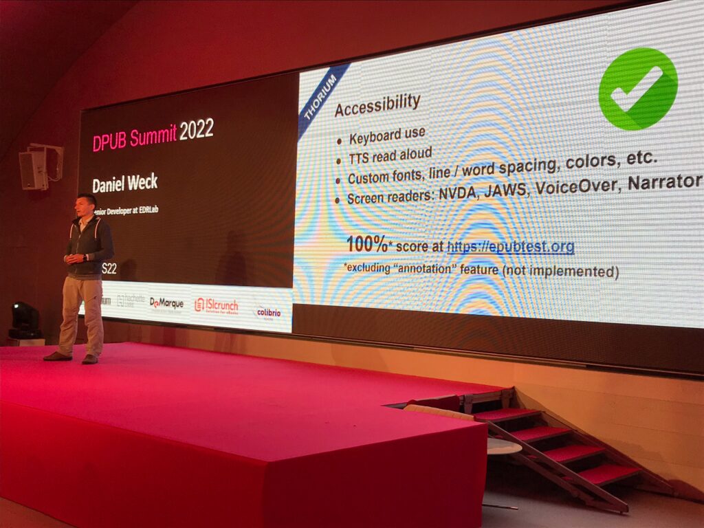 D. Weck in front of a large screen showing that Thorium has a 100% accessibility score.
