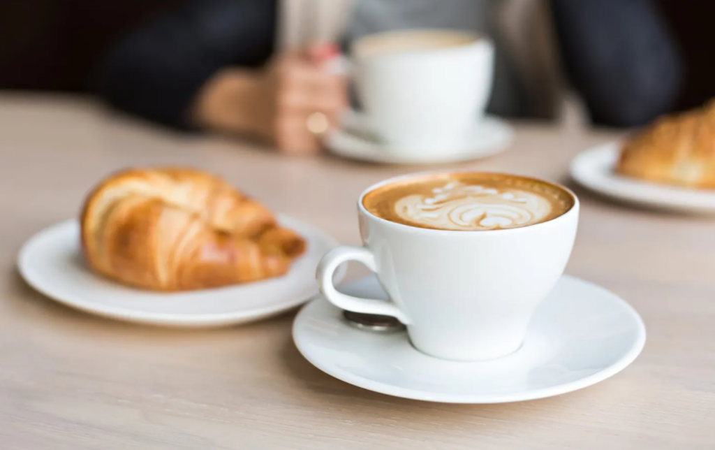 Image of a croissant and coffee